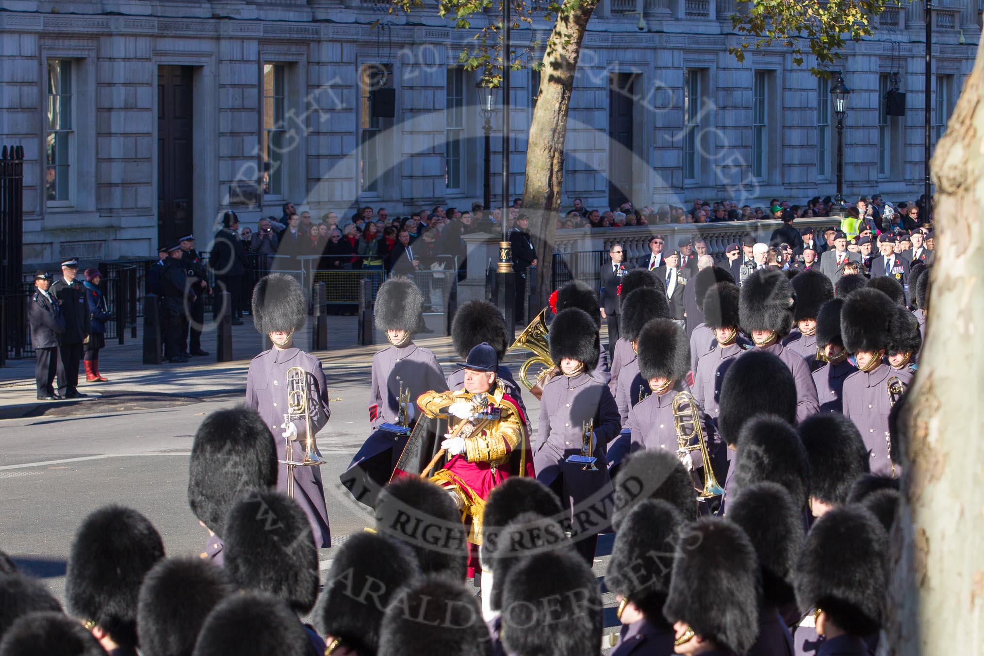 Remembrance Sunday 2012 Cenotaph March Past: One of the Massed Bands, with Drum Major Stephen Staite, Grenadier Guards, in the lead, marches forward..
Whitehall, Cenotaph,
London SW1,

United Kingdom,
on 11 November 2012 at 11:53, image #761