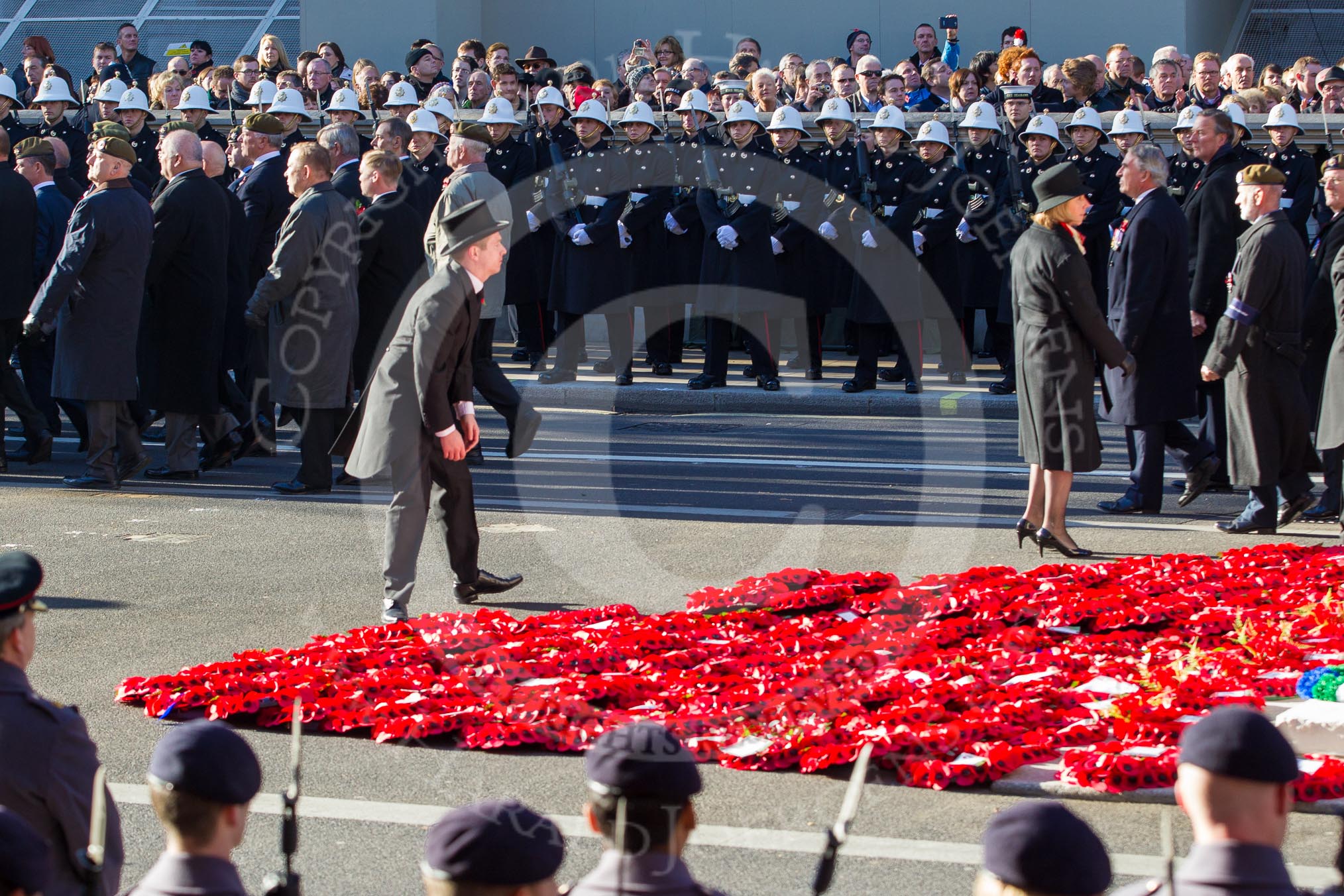 Remembrance Sunday 2012 Cenotaph March Past: Wreaths are placed at the western side of the Cenotaph during the March Past, creating a field of red poppies..
Whitehall, Cenotaph,
London SW1,

United Kingdom,
on 11 November 2012 at 11:53, image #763
