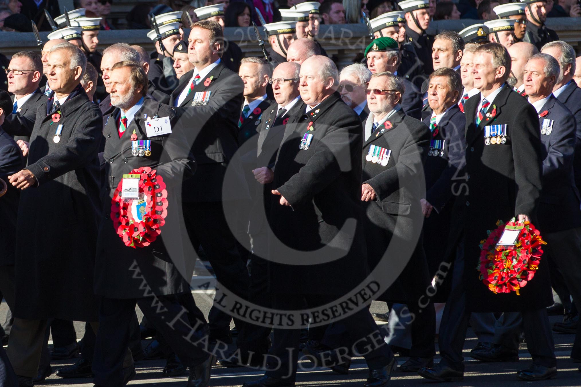 Remembrance Sunday 2012 Cenotaph March Past: Group D1 - South Atlantic Medal Association (www.sama82.org.uk), veterans of the Falklands war in 1982 and islanders from that time..
Whitehall, Cenotaph,
London SW1,

United Kingdom,
on 11 November 2012 at 12:04, image #1204