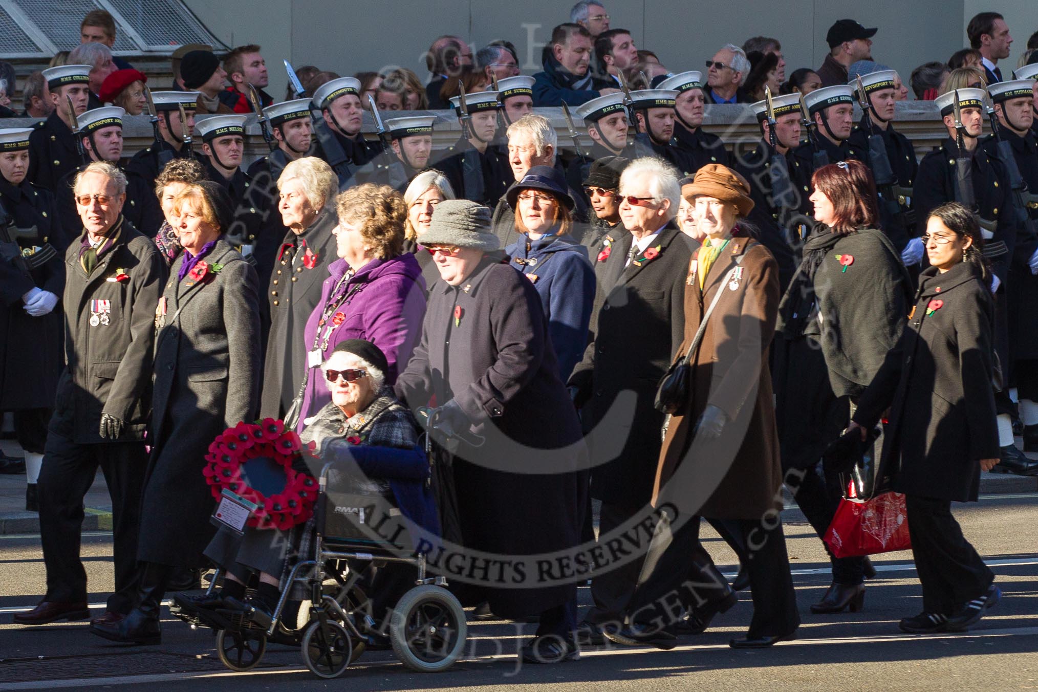 Remembrance Sunday 2012 Cenotaph March Past: Group M9 - NAAFI,  M10- Women's Royal Voluntary Service and M11 - Civil Defence Association..
Whitehall, Cenotaph,
London SW1,

United Kingdom,
on 11 November 2012 at 12:10, image #1496