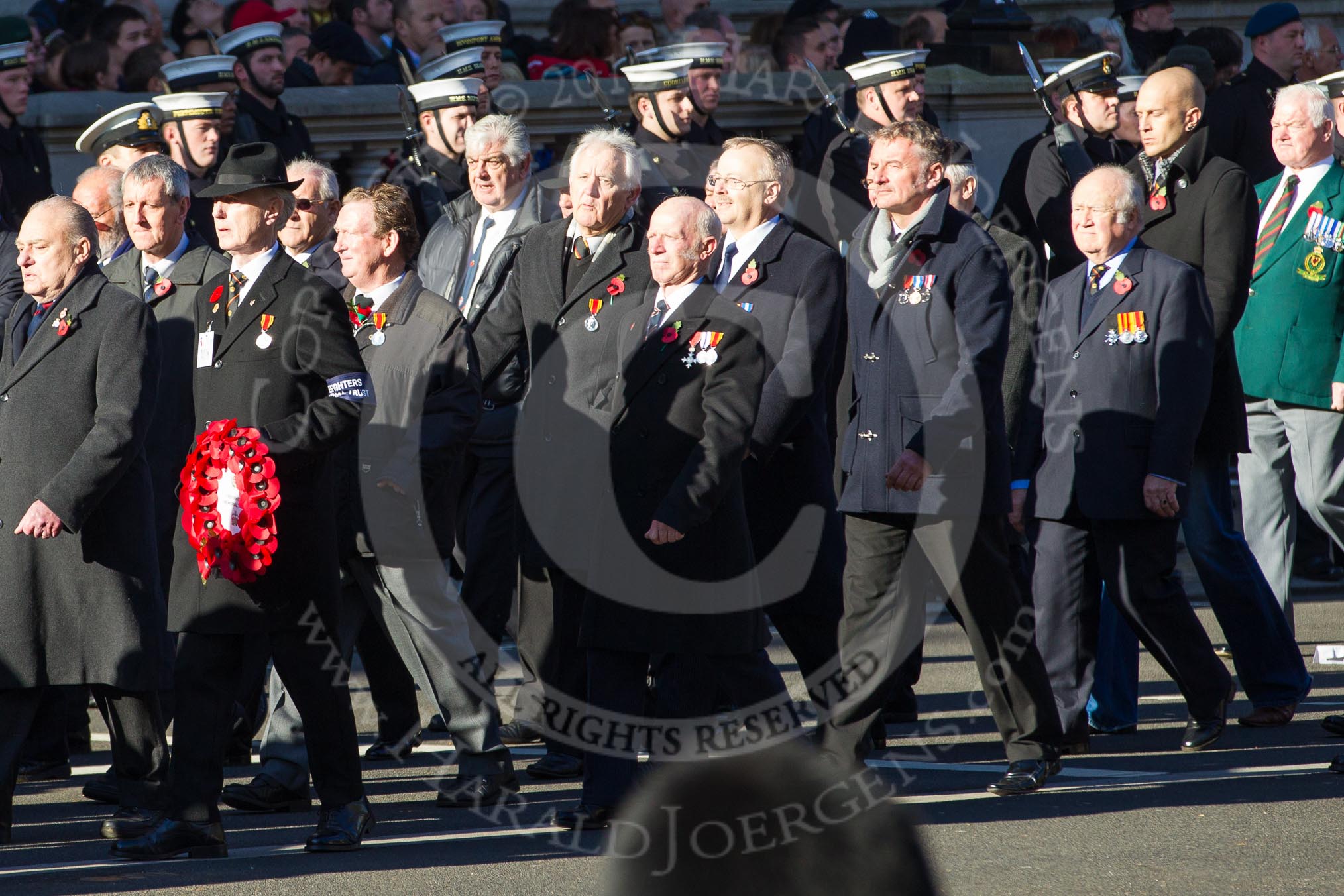 Remembrance Sunday 2012 Cenotaph March Past: Group M17 - St Andrew's Ambulance Association, and M18 - Firefighters Memorial Charitable Trust..
Whitehall, Cenotaph,
London SW1,

United Kingdom,
on 11 November 2012 at 12:11, image #1542