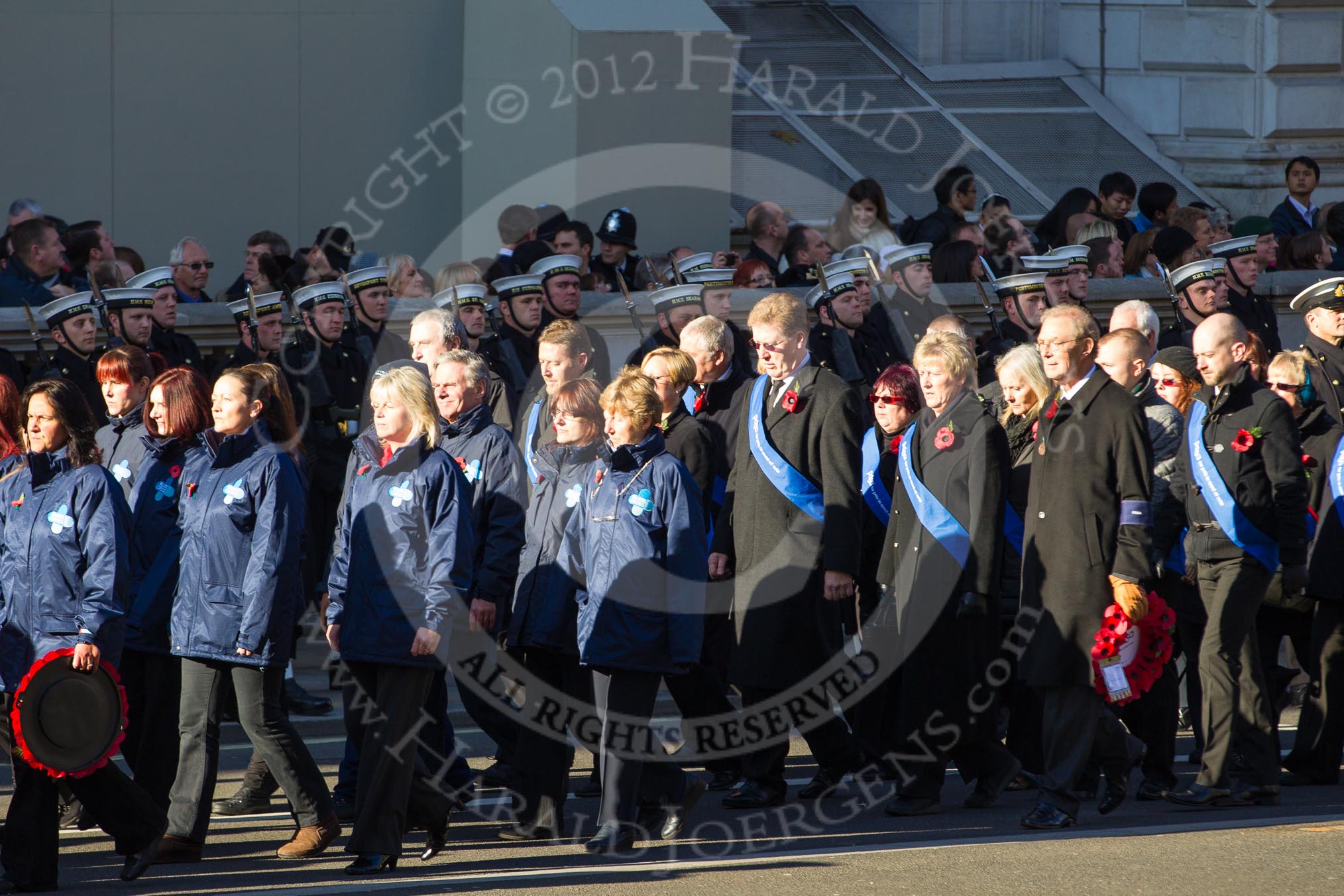Remembrance Sunday 2012 Cenotaph March Past: Group M26 - The Blue Cross and M27 - PDSA..
Whitehall, Cenotaph,
London SW1,

United Kingdom,
on 11 November 2012 at 12:13, image #1600