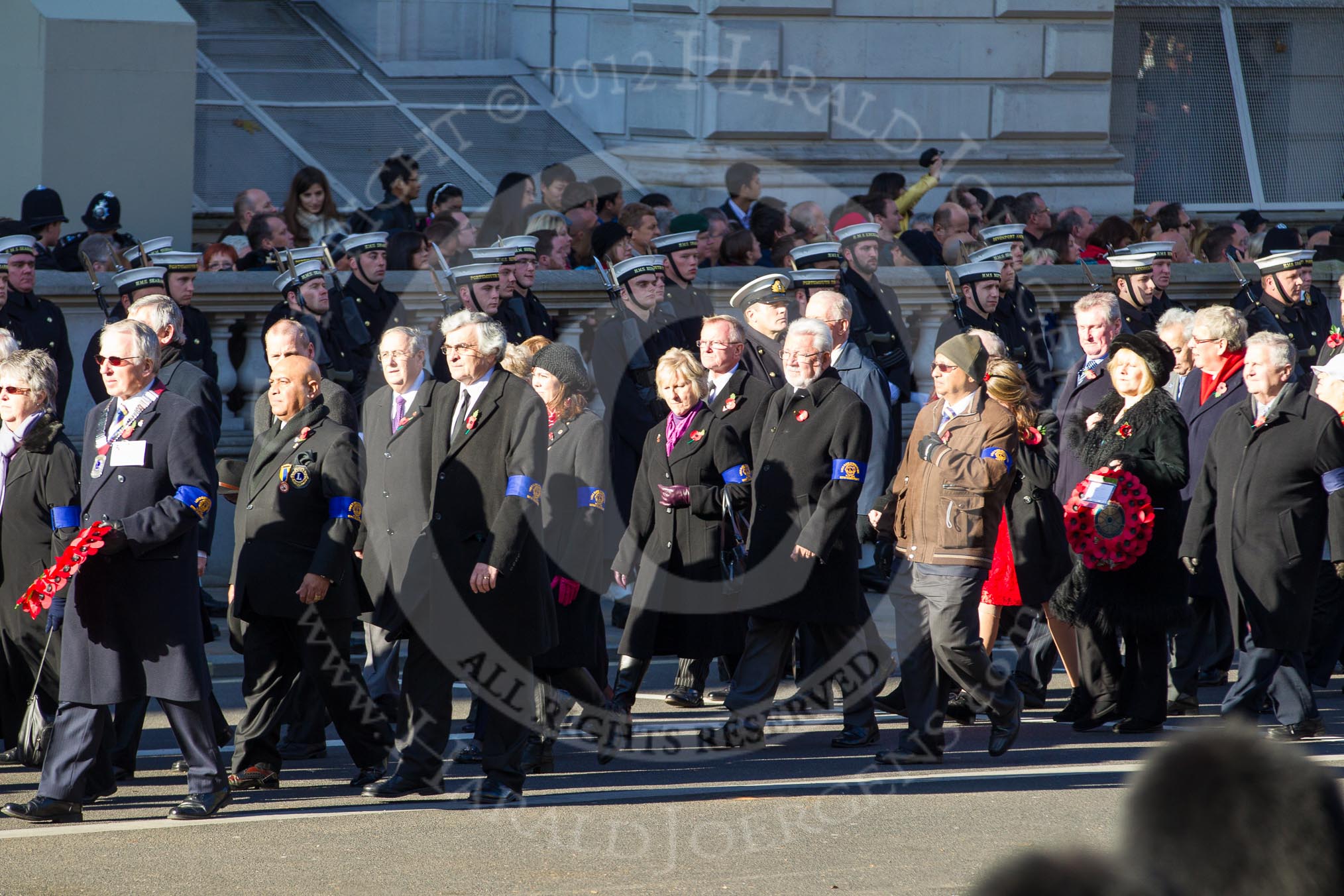 Remembrance Sunday 2012 Cenotaph March Past: Group M39 - Lions Club International and M40 - Rotary International..
Whitehall, Cenotaph,
London SW1,

United Kingdom,
on 11 November 2012 at 12:14, image #1656
