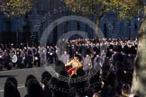 Remembrance Sunday 2012 Cenotaph March Past: The Massed Bands have changing direction, leading the band on the southern side of Whitehall Drum Major Stephen Staite, Grenadier Guards..
Whitehall, Cenotaph,
London SW1,

United Kingdom,
on 11 November 2012 at 11:32, image #29