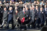 Remembrance Sunday 2012 Cenotaph March Past: Group E14 - Fleet Air Arm Safety Equipment & Survival Association, in charge of service and maintenance of aircrew emergency equipment including Life-rafts, Personal Survival Packs, Parachutes and Aircrew clothing, as well as aircraft egress and land survival training. Wreath carrier and group leader is David Philpot,  Ex Chief Petty Officer (Airman) Survival Equipment..
Whitehall, Cenotaph,
London SW1,

United Kingdom,
on 11 November 2012 at 11:40, image #115