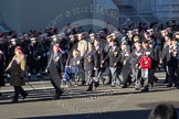 Remembrance Sunday 2012 Cenotaph March Past: Group D9 - Trucial Oman Scouts Association and D10 - Bond Van Wapenbroeders..
Whitehall, Cenotaph,
London SW1,

United Kingdom,
on 11 November 2012 at 12:06, image #1301