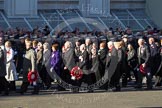 Remembrance Sunday 2012 Cenotaph March Past: Group M5  - Children of the Far East Prisoners of War and M6 - Evacuees Reunion Association..
Whitehall, Cenotaph,
London SW1,

United Kingdom,
on 11 November 2012 at 12:10, image #1471