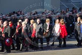 Remembrance Sunday 2012 Cenotaph March Past: Group M22 - Daniel's Trust and M23 - Civilians Representing Families..
Whitehall, Cenotaph,
London SW1,

United Kingdom,
on 11 November 2012 at 12:12, image #1576
