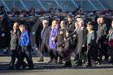 Remembrance Sunday 2012 Cenotaph March Past: Group M23 - Civilians Representing Families..
Whitehall, Cenotaph,
London SW1,

United Kingdom,
on 11 November 2012 at 12:12, image #1584