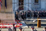 Remembrance Sunday 2012 Cenotaph March Past: The eastern side of the Cenotaph after the March Past, with the bright red of all the wreaths. Behind the lines of Royal Marines standing in front of the Foreign- and Commonweatlt Office building..
Whitehall, Cenotaph,
London SW1,

United Kingdom,
on 11 November 2012 at 12:16, image #1769