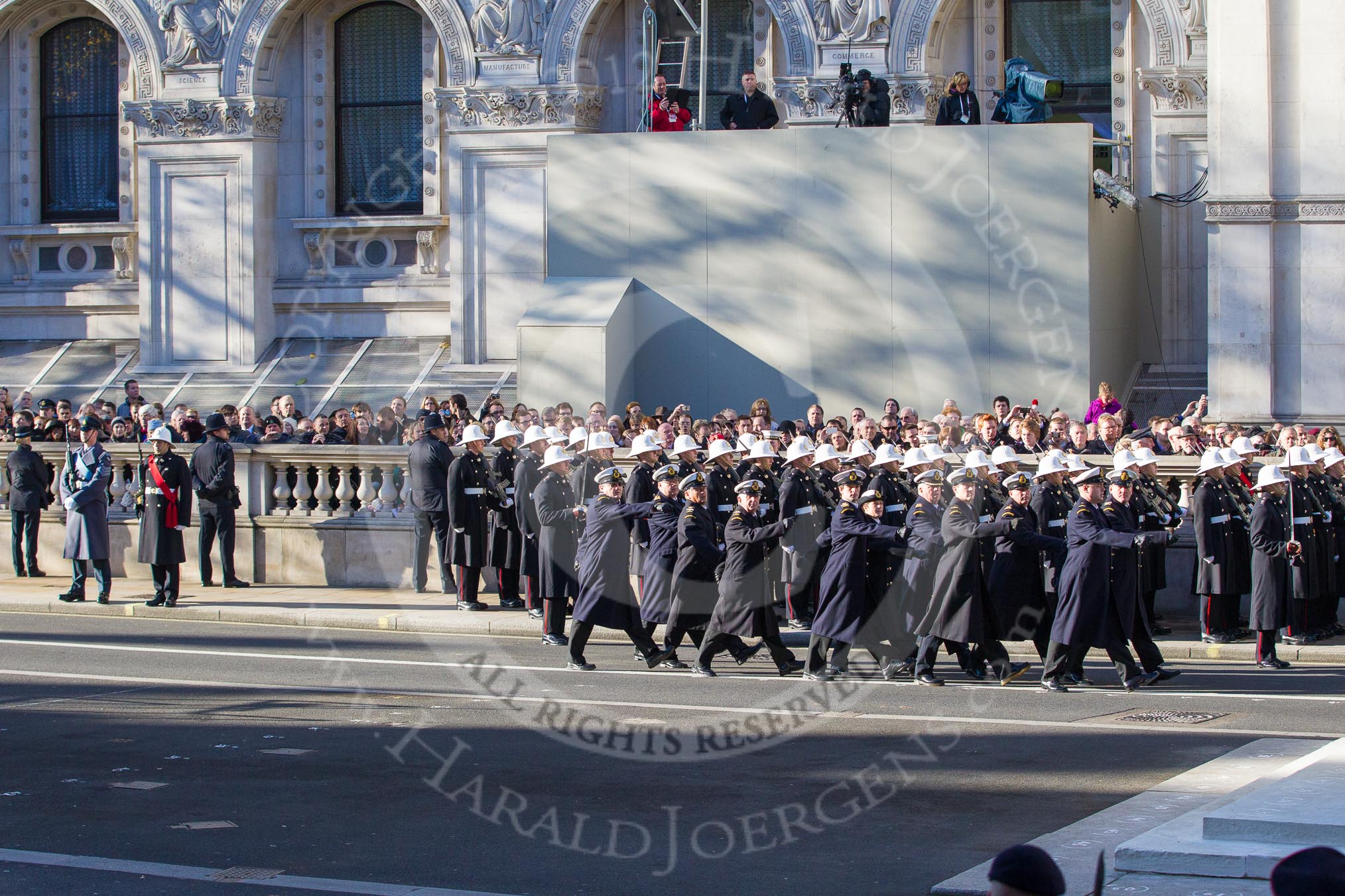 The Royal Marines and Royal Navy detachment marching past the Cenotaph.