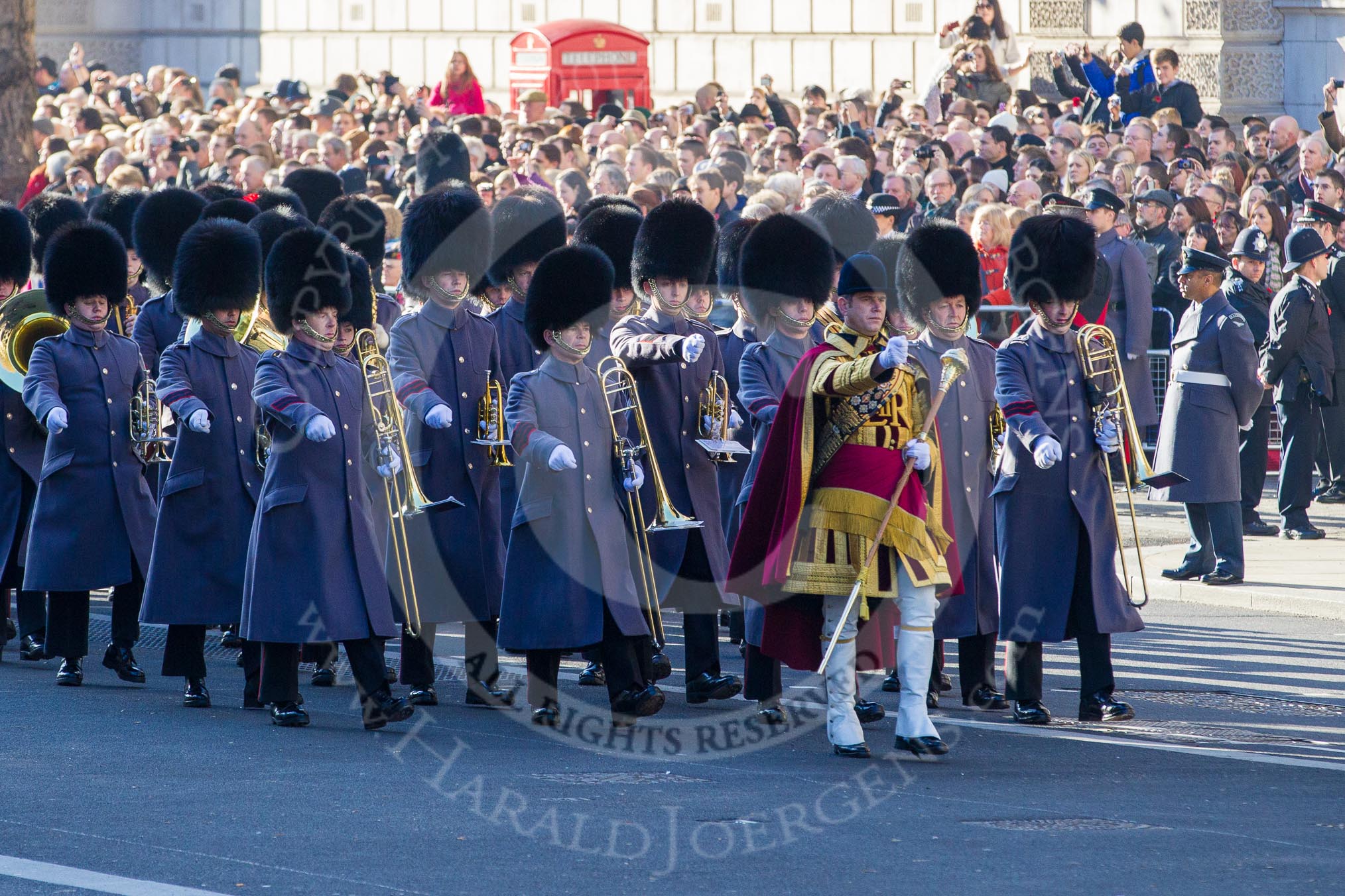 Senior Drum Major Matthew Betts, Grenadier Guards, arriving with another of the Massed Bands of the Guards.