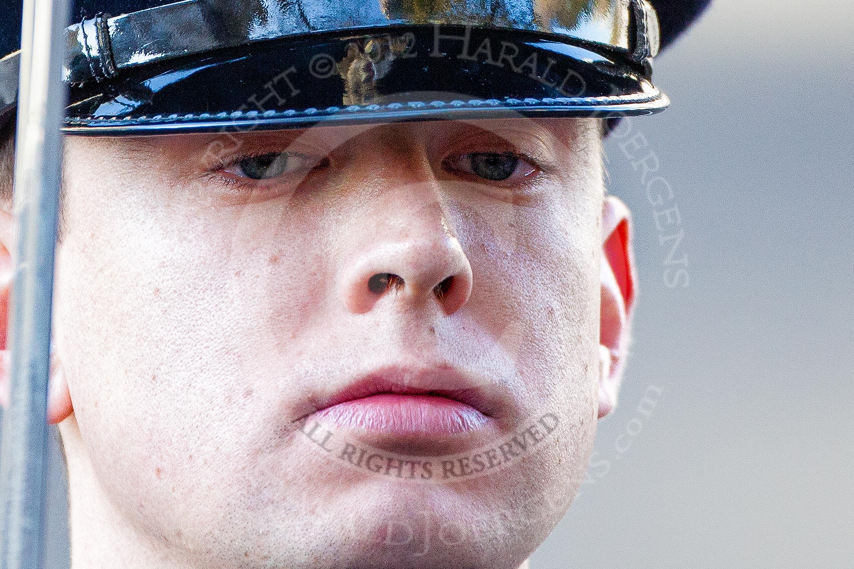 A young Lieutenant from the Royal Logistic Corps - a "face in the crowd" that represents for me the spmbre mood of the occasion.