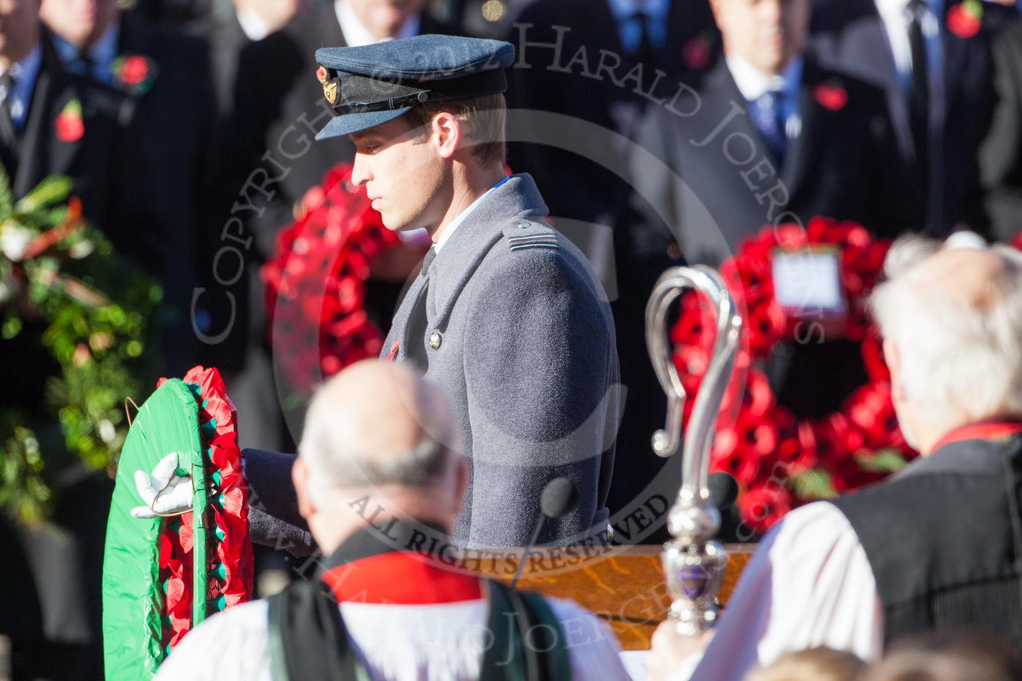 HRH The Duke od Cambridge about to lay his wreath at the Cenotaph. In the foreground, and out of focus, the Bishop of London.