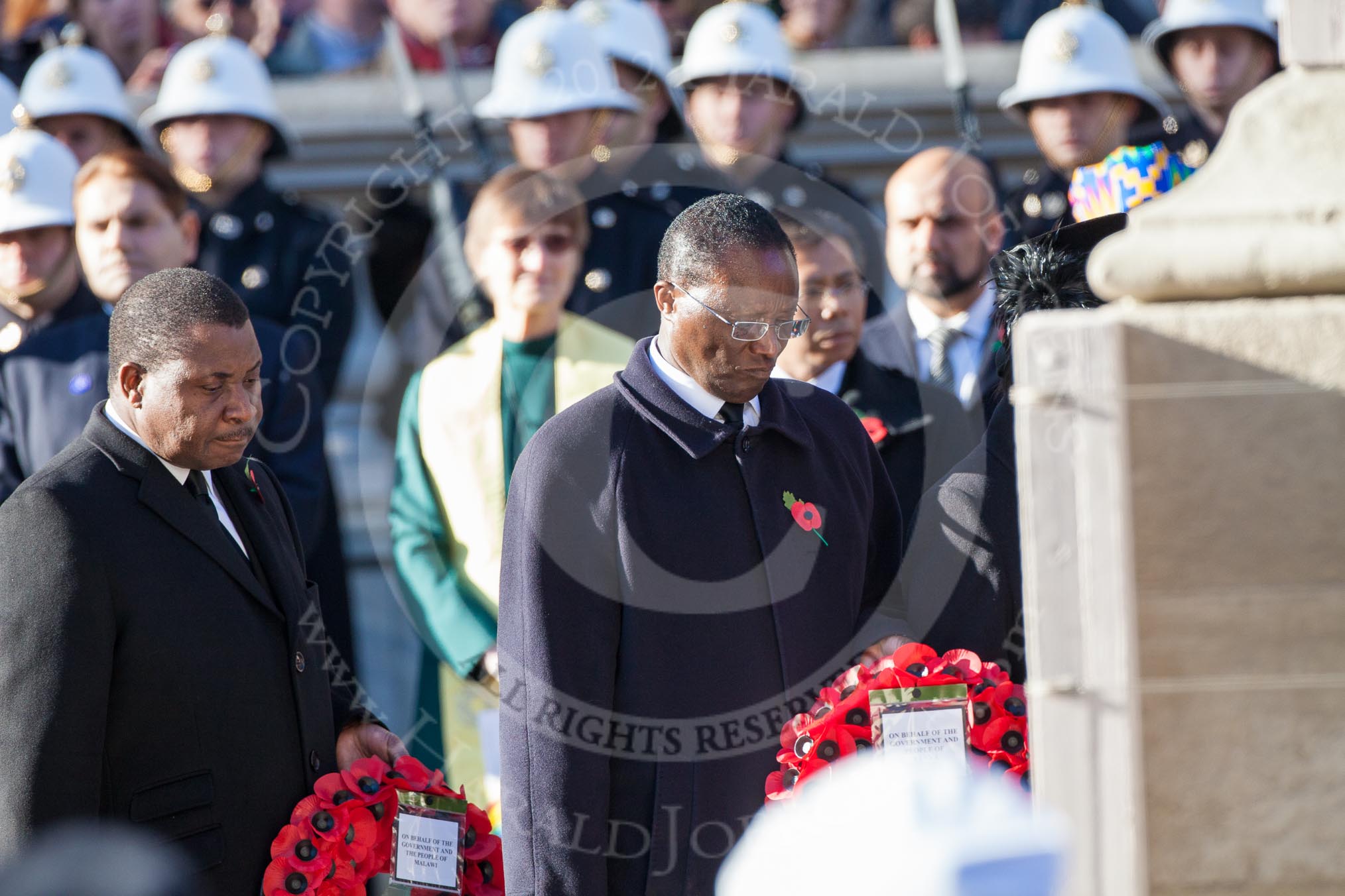 The High Commissioners lay there wreaths at the Cenotaph, partly out of view of the camera. In view the High Commissioners of Malawi and Kenya.