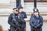 Tight security at Whitehall - Metropolitan Police officers, including Armed Police, in front of the Foreign and Commonwealth Building.