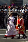 10:53am - the Choir, led by the Cross Bearer, Jack Fonseca-Burtt, followed by 10 children of the Chapel Royal, emerges from the Foreign and Commonwealth Building.