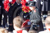 Remembrance Sunday at the Cenotaph 2012 HM The Queen, about to lay her wreath at the Cenotaph. On the left Lieutenant Commander Andrew Canale, Royal Navy, as Equerry.