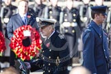 HRH The Duke of Edinburgh, about to lay the wreath that has just been given to him by the Equerry, Squadron Leader Dale White, RAF, on the right.