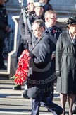 Nigel Dodds, as the Deputy Leader of the Democratic Unionist Party, about to lau a wreath at the Cenotaph.