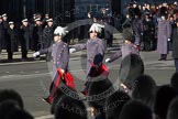Major-General George Norton CBE, General Officer Commanding London District and Major-General commanding the Household Division, is leaveing Whitehall after the service, followed by his Chief of Staff and Aide-de-Camp.