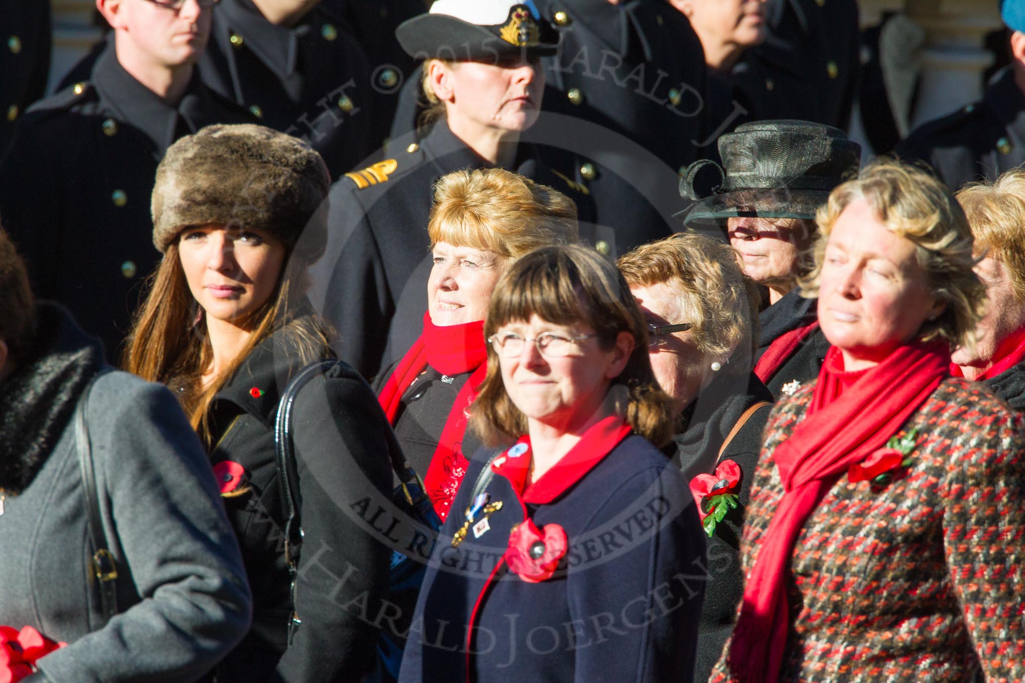 Remembrance Sunday Cenotaph March Past 2013: D1 - War Widows Association. The War Widows' Association exisits to improve the conditions of all War Widow/ers in the United Kingdom. The Association formed in 1971 following an article in a Sunday newspaper that highlighted the plight of Britain’s “forgotten women”. The Association gained charitable status in 1991 and continues to campaign against injustice..
Press stand opposite the Foreign Office building, Whitehall, London SW1,
London,
Greater London,
United Kingdom,
on 10 November 2013 at 11:38, image #29