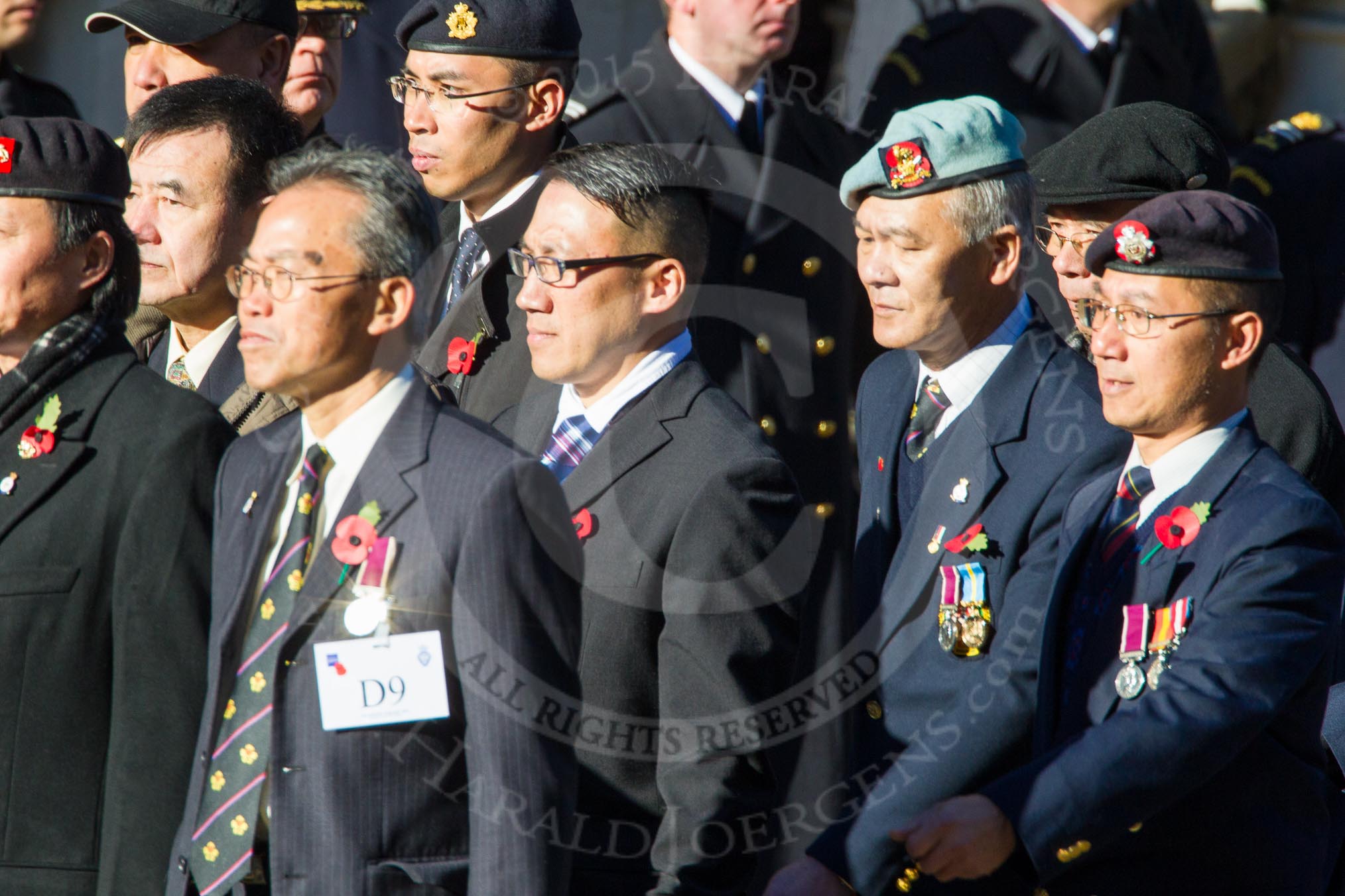 Remembrance Sunday Cenotaph March Past 2013: D9 - Hong Kong Ex-Servicemen's Association (UK Branch)..
Press stand opposite the Foreign Office building, Whitehall, London SW1,
London,
Greater London,
United Kingdom,
on 10 November 2013 at 11:39, image #78