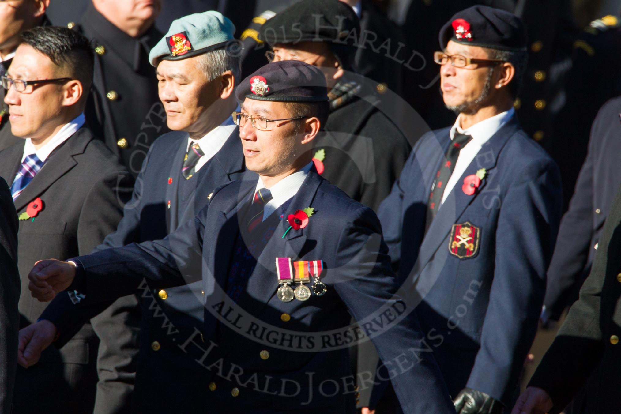 Remembrance Sunday Cenotaph March Past 2013: D9 - Hong Kong Ex-Servicemen's Association (UK Branch)..
Press stand opposite the Foreign Office building, Whitehall, London SW1,
London,
Greater London,
United Kingdom,
on 10 November 2013 at 11:39, image #79