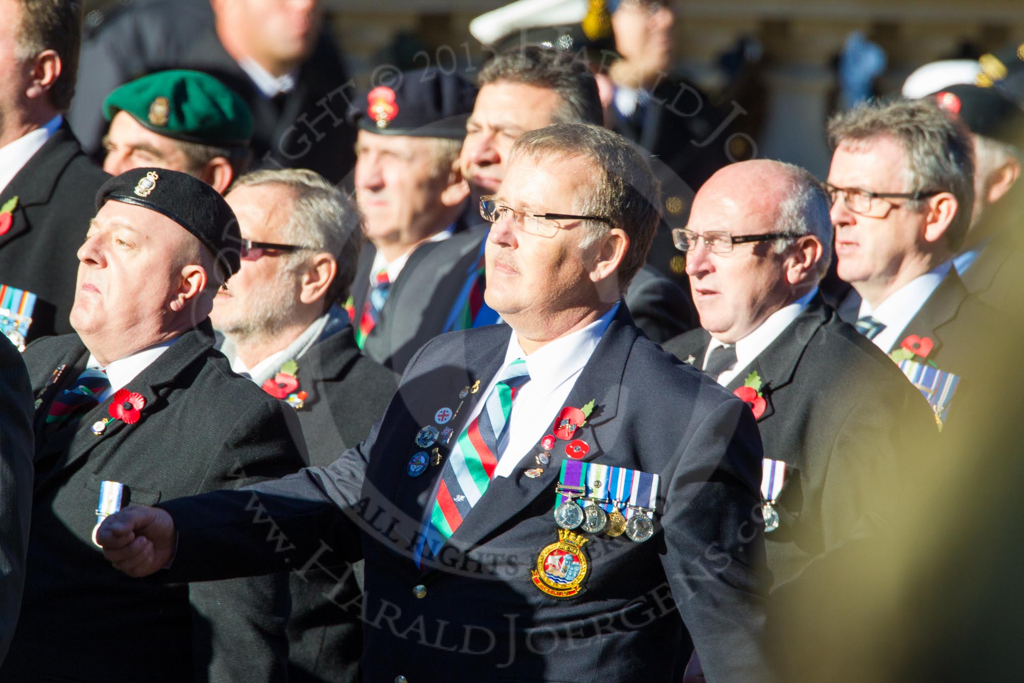 Remembrance Sunday Cenotaph March Past 2013: D23 - South Atlantic Medal Association (SAMA 82): The South Atlantic Medal (1982) is the official name of the medal awarded to almost 30,000 service men and women - and civilians - who took part in the campaign to liberate the Falkland Islands in 1982. The South Atlantic Medal Association is their Association..
Press stand opposite the Foreign Office building, Whitehall, London SW1,
London,
Greater London,
United Kingdom,
on 10 November 2013 at 11:41, image #173