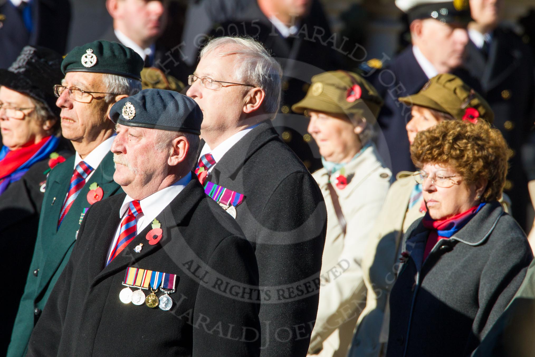 Remembrance Sunday Cenotaph March Past 2013: D24 - SSAFA Forces Help, set up to help former and serving members of the British Armed Forces and their families or dependants. On the left, with the RAF beret, is the Parade Commander, Mr Kevin Trethowan, who has volunteered for SSAFA since 1998..
Press stand opposite the Foreign Office building, Whitehall, London SW1,
London,
Greater London,
United Kingdom,
on 10 November 2013 at 11:41, image #202