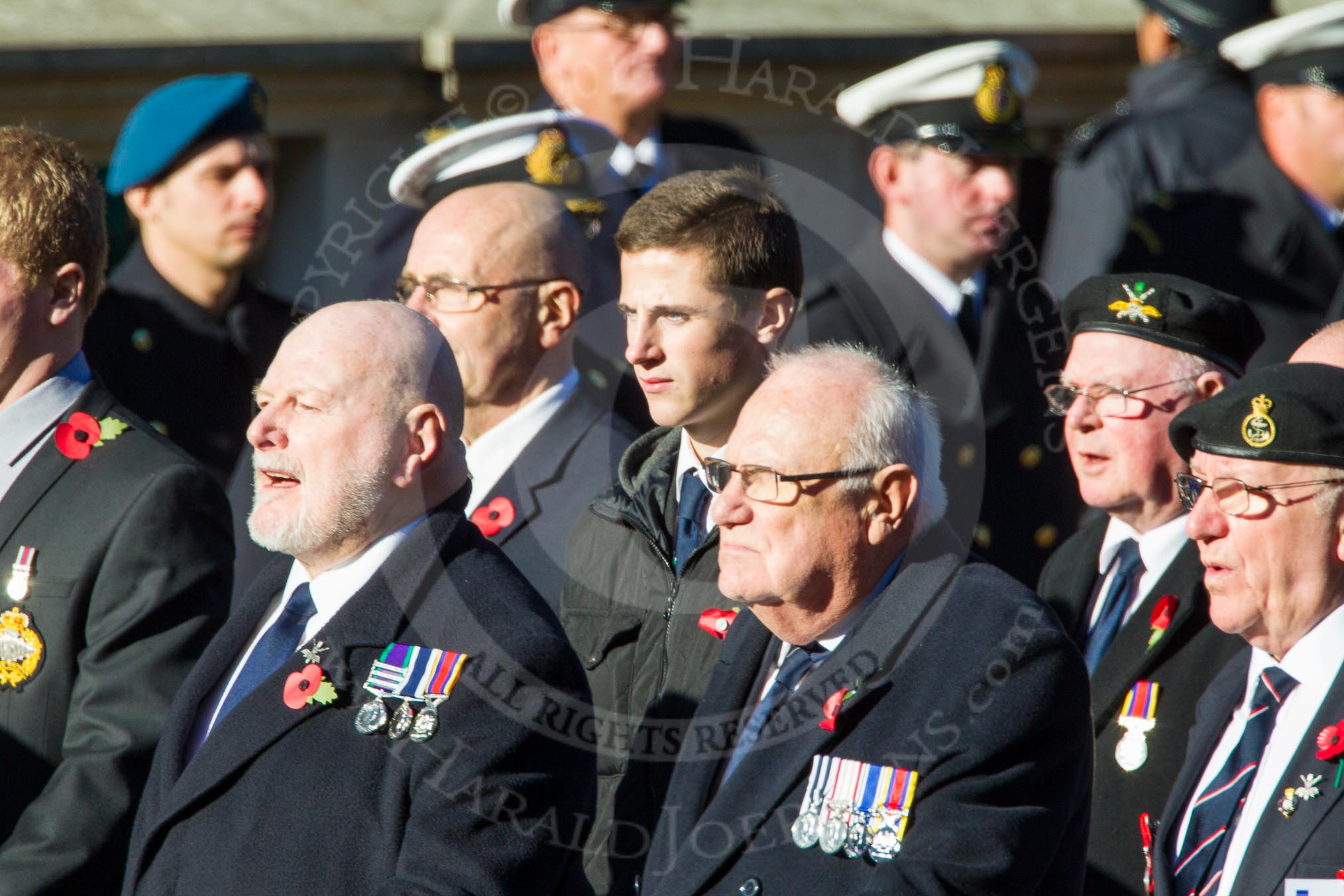 Remembrance Sunday Cenotaph March Past 2013: E8 - Fleet Air Arm Armourers Association..
Press stand opposite the Foreign Office building, Whitehall, London SW1,
London,
Greater London,
United Kingdom,
on 10 November 2013 at 11:45, image #425