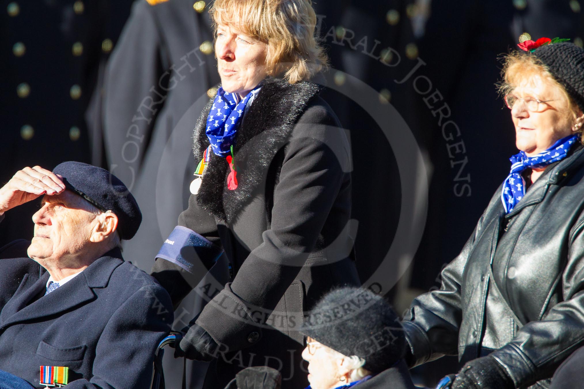 Remembrance Sunday Cenotaph March Past 2013: E34 - Royal Naval Benevolent Trust..
Press stand opposite the Foreign Office building, Whitehall, London SW1,
London,
Greater London,
United Kingdom,
on 10 November 2013 at 11:48, image #647