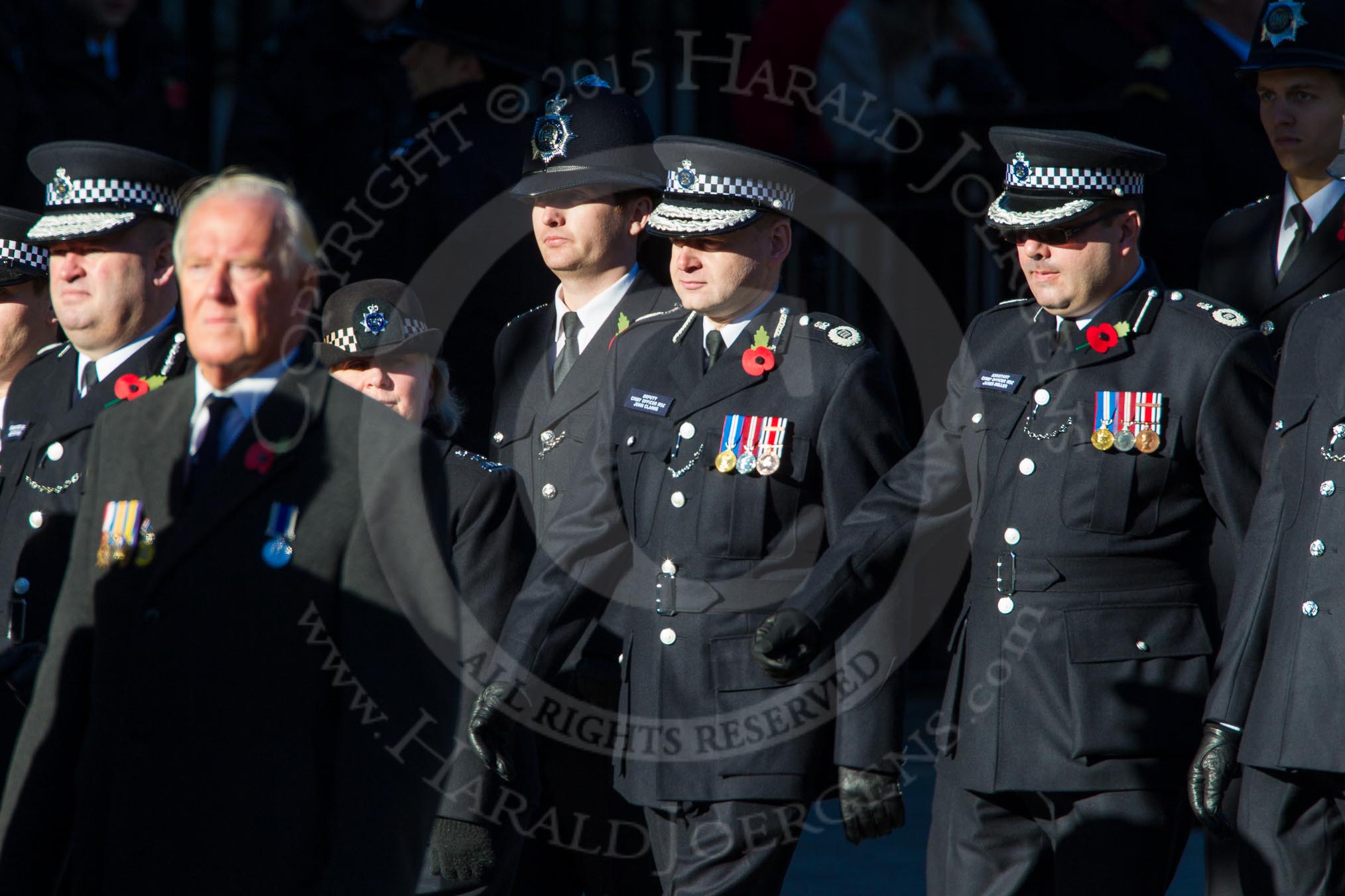 Remembrance Sunday Cenotaph March Past 2013: M13 - Metropolitan Special Constabulary. Special Sergeant Patricia Johnson, Deputy Chief Officer John Clarke, and Assistant Chief Officer James Deller..
Press stand opposite the Foreign Office building, Whitehall, London SW1,
London,
Greater London,
United Kingdom,
on 10 November 2013 at 12:10, image #1957