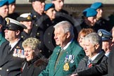 Remembrance Sunday Cenotaph March Past 2013: E12 - Fleet Air Arm Junglie Association..
Press stand opposite the Foreign Office building, Whitehall, London SW1,
London,
Greater London,
United Kingdom,
on 10 November 2013 at 11:45, image #461