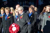 Remembrance Sunday Cenotaph March Past 2013: M27 - PDSA..
Press stand opposite the Foreign Office building, Whitehall, London SW1,
London,
Greater London,
United Kingdom,
on 10 November 2013 at 12:12, image #2088