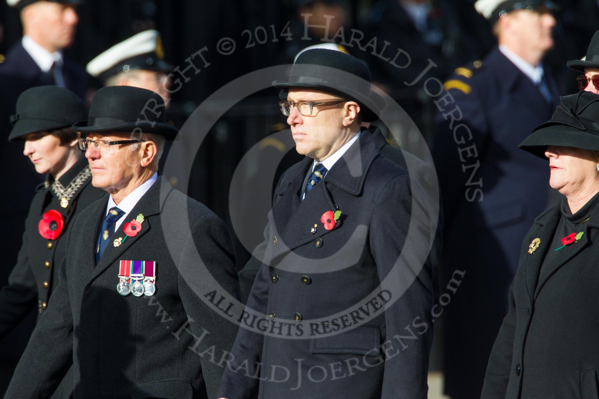 Remembrance Sunday at the Cenotaph in London 2014: Members of the Royal British Legion (?) leading the March Past.
Press stand opposite the Foreign Office building, Whitehall, London SW1,
London,
Greater London,
United Kingdom,
on 09 November 2014 at 11:37, image #10