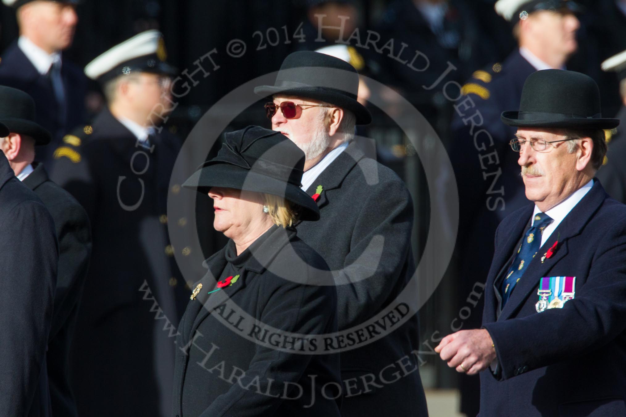 Remembrance Sunday at the Cenotaph in London 2014: Members of the Royal British Legion (?) leading the March Past.
Press stand opposite the Foreign Office building, Whitehall, London SW1,
London,
Greater London,
United Kingdom,
on 09 November 2014 at 11:37, image #11
