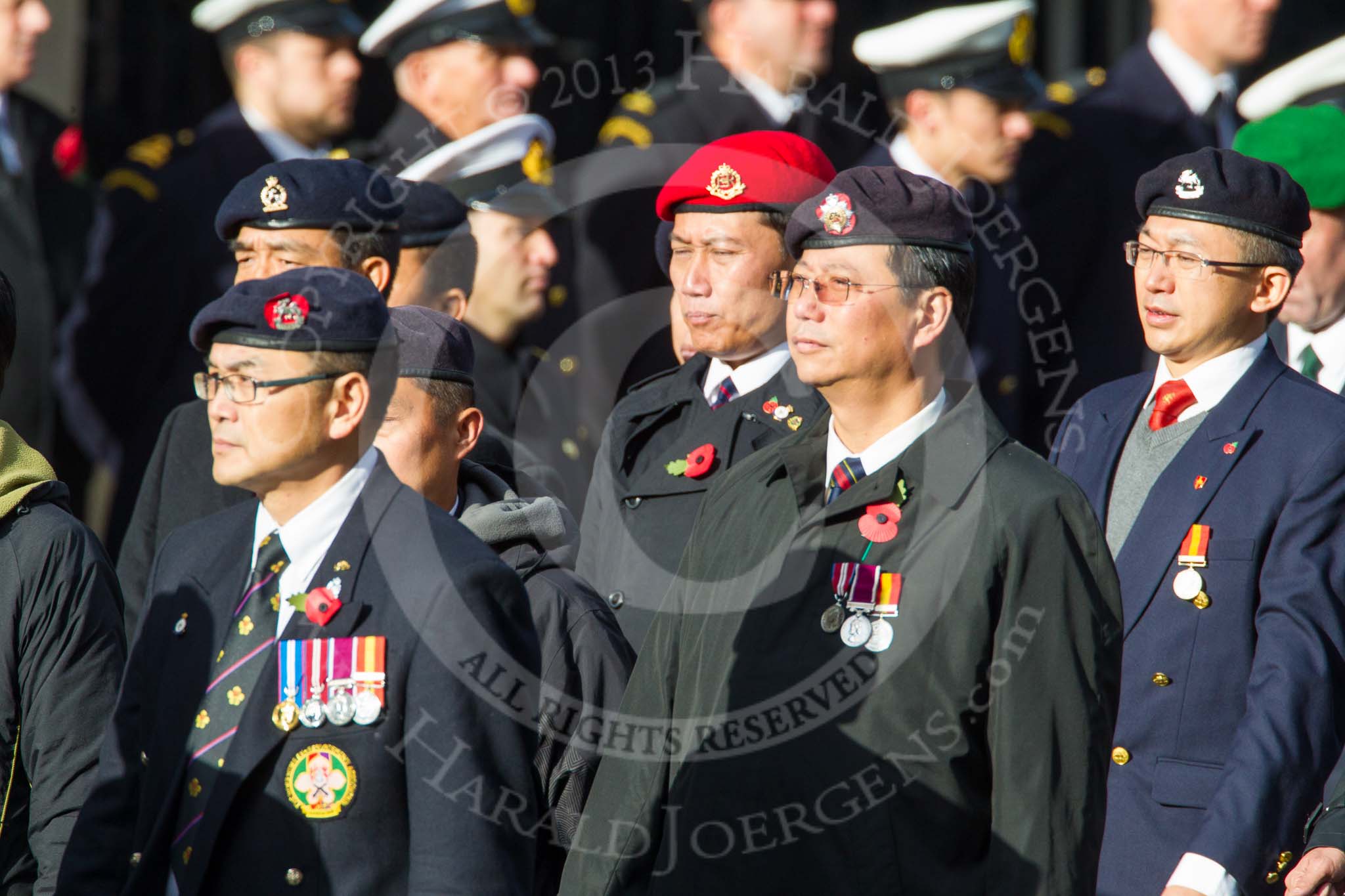 Remembrance Sunday at the Cenotaph in London 2014: Group D2 - Hong Kong Ex-Servicemen's Association (UK Branch).
Press stand opposite the Foreign Office building, Whitehall, London SW1,
London,
Greater London,
United Kingdom,
on 09 November 2014 at 11:43, image #282