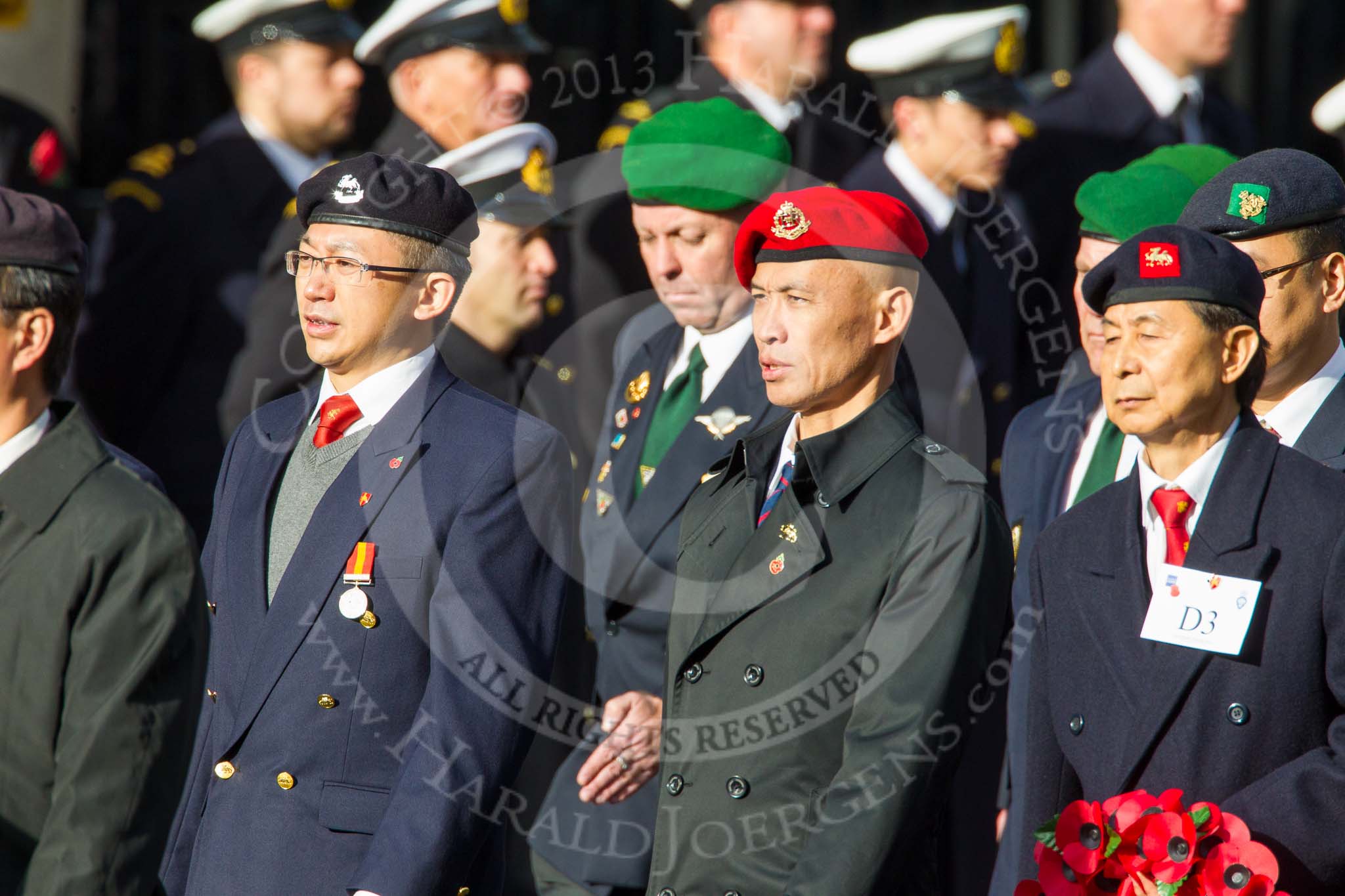 Remembrance Sunday at the Cenotaph in London 2014: Group D3 - Hong Kong Military Service Corps.
Press stand opposite the Foreign Office building, Whitehall, London SW1,
London,
Greater London,
United Kingdom,
on 09 November 2014 at 11:43, image #283