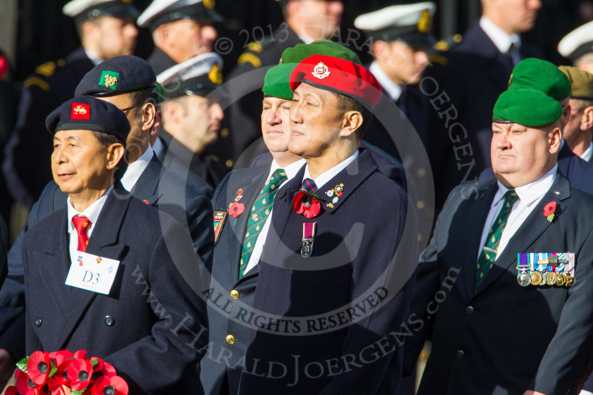 Remembrance Sunday at the Cenotaph in London 2014: Group D3 - Hong Kong Military Service Corps.
Press stand opposite the Foreign Office building, Whitehall, London SW1,
London,
Greater London,
United Kingdom,
on 09 November 2014 at 11:43, image #284