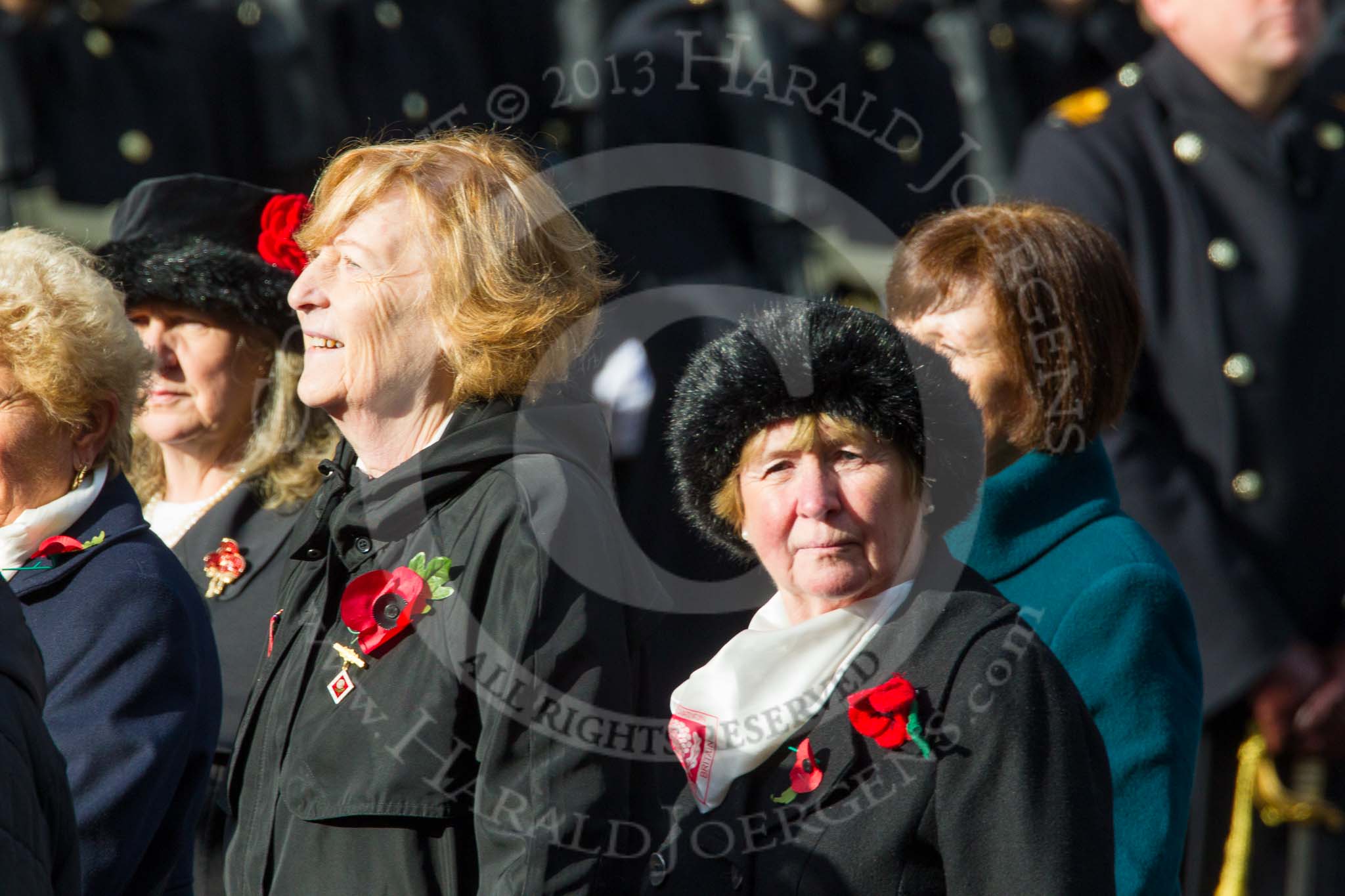 Remembrance Sunday at the Cenotaph in London 2014: Group D24 - War Widows Association.
Press stand opposite the Foreign Office building, Whitehall, London SW1,
London,
Greater London,
United Kingdom,
on 09 November 2014 at 11:47, image #458