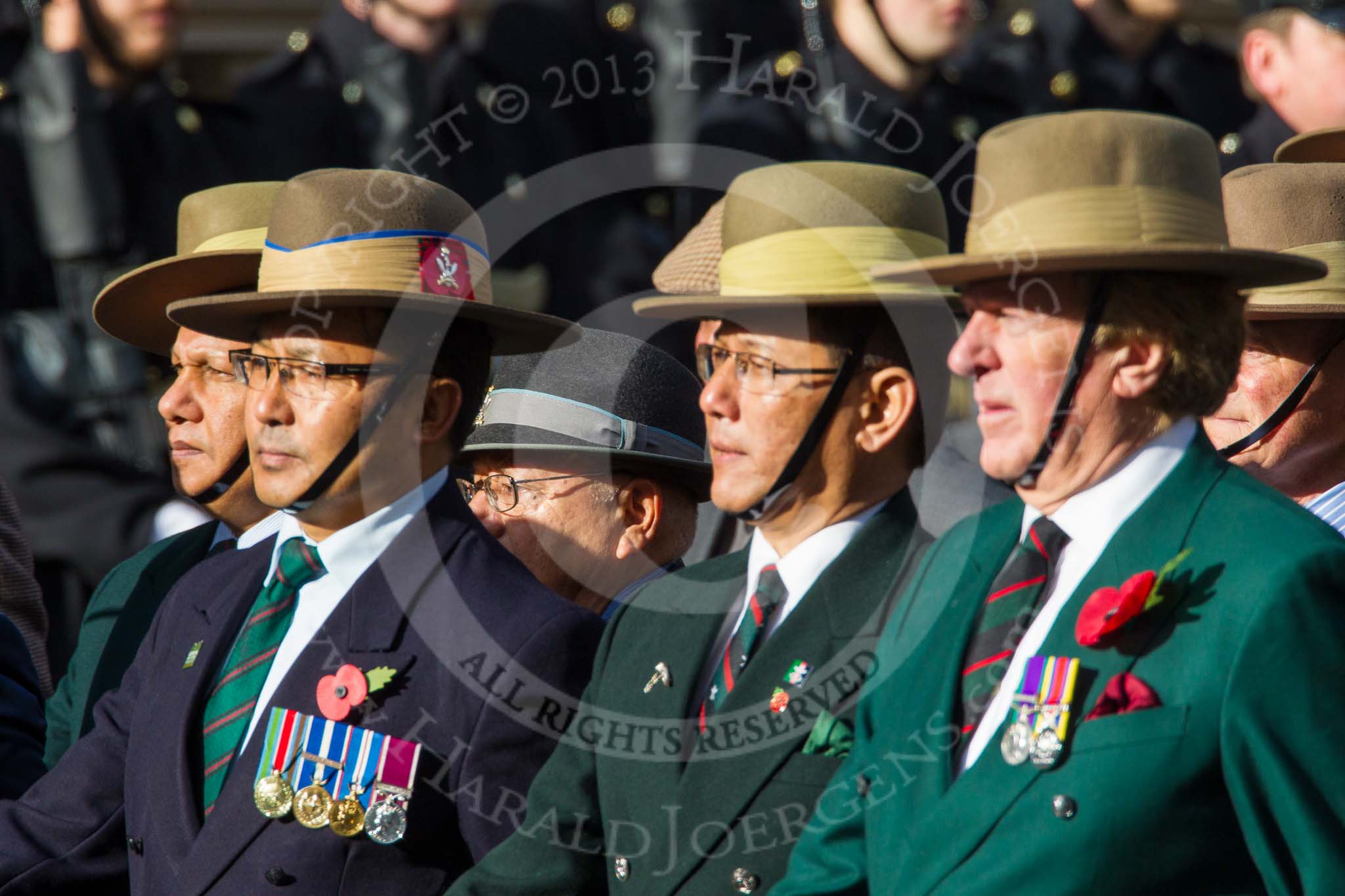 Remembrance Sunday at the Cenotaph in London 2014: Group D25 - Gurkha Brigade Association.
Press stand opposite the Foreign Office building, Whitehall, London SW1,
London,
Greater London,
United Kingdom,
on 09 November 2014 at 11:47, image #464