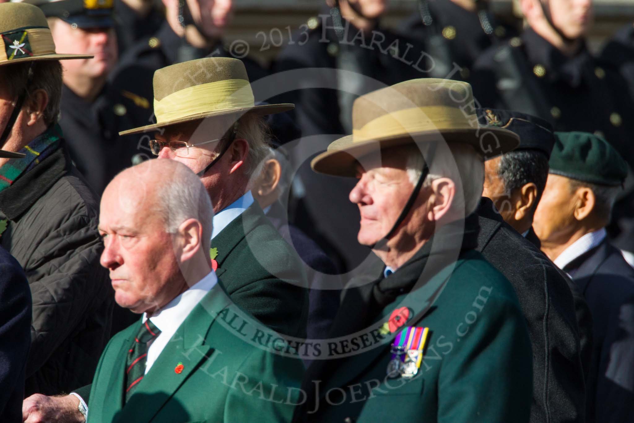 Remembrance Sunday at the Cenotaph in London 2014: Group D25 - Gurkha Brigade Association.
Press stand opposite the Foreign Office building, Whitehall, London SW1,
London,
Greater London,
United Kingdom,
on 09 November 2014 at 11:47, image #467
