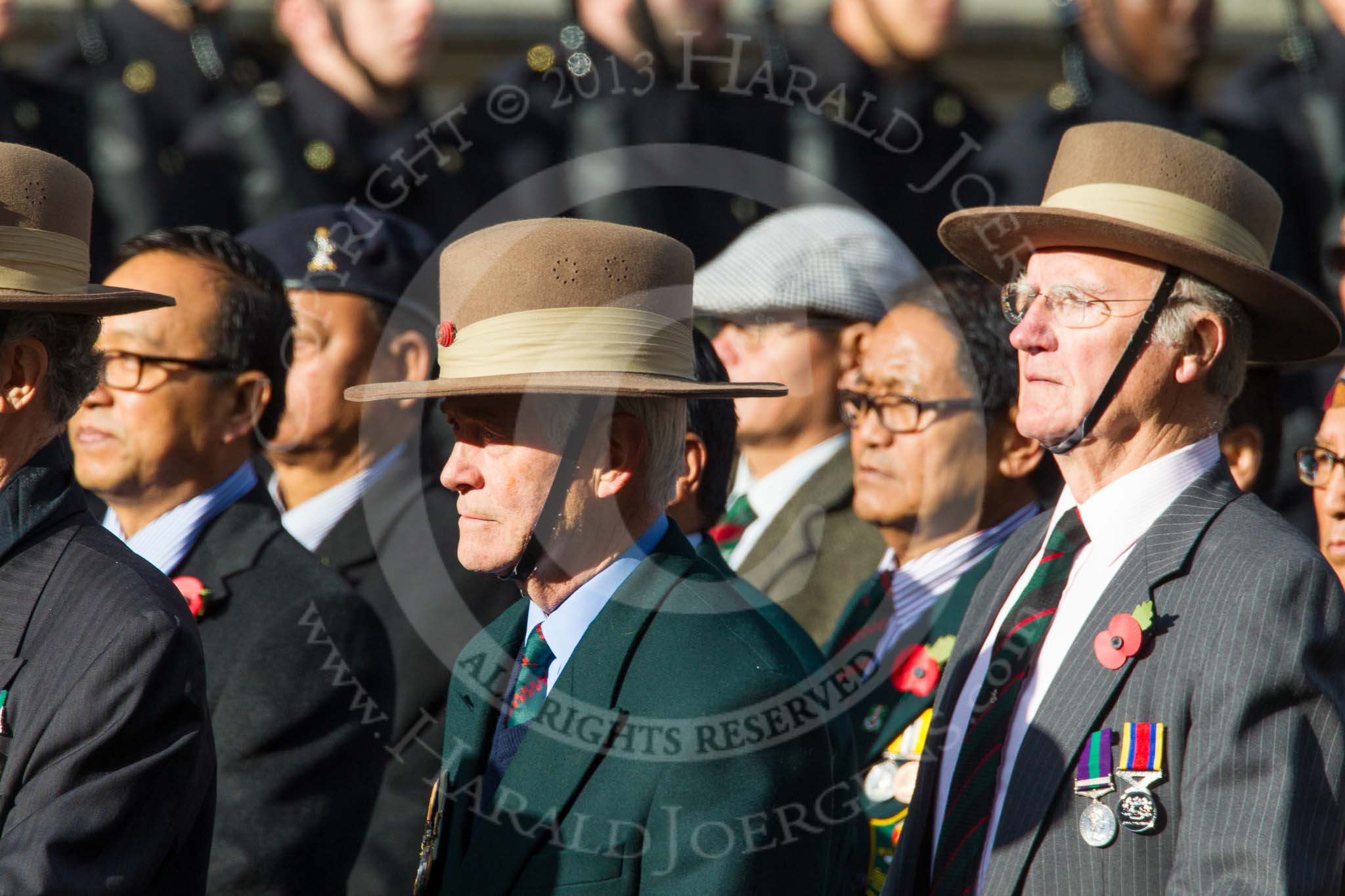 Remembrance Sunday at the Cenotaph in London 2014: Group D25 - Gurkha Brigade Association.
Press stand opposite the Foreign Office building, Whitehall, London SW1,
London,
Greater London,
United Kingdom,
on 09 November 2014 at 11:47, image #470