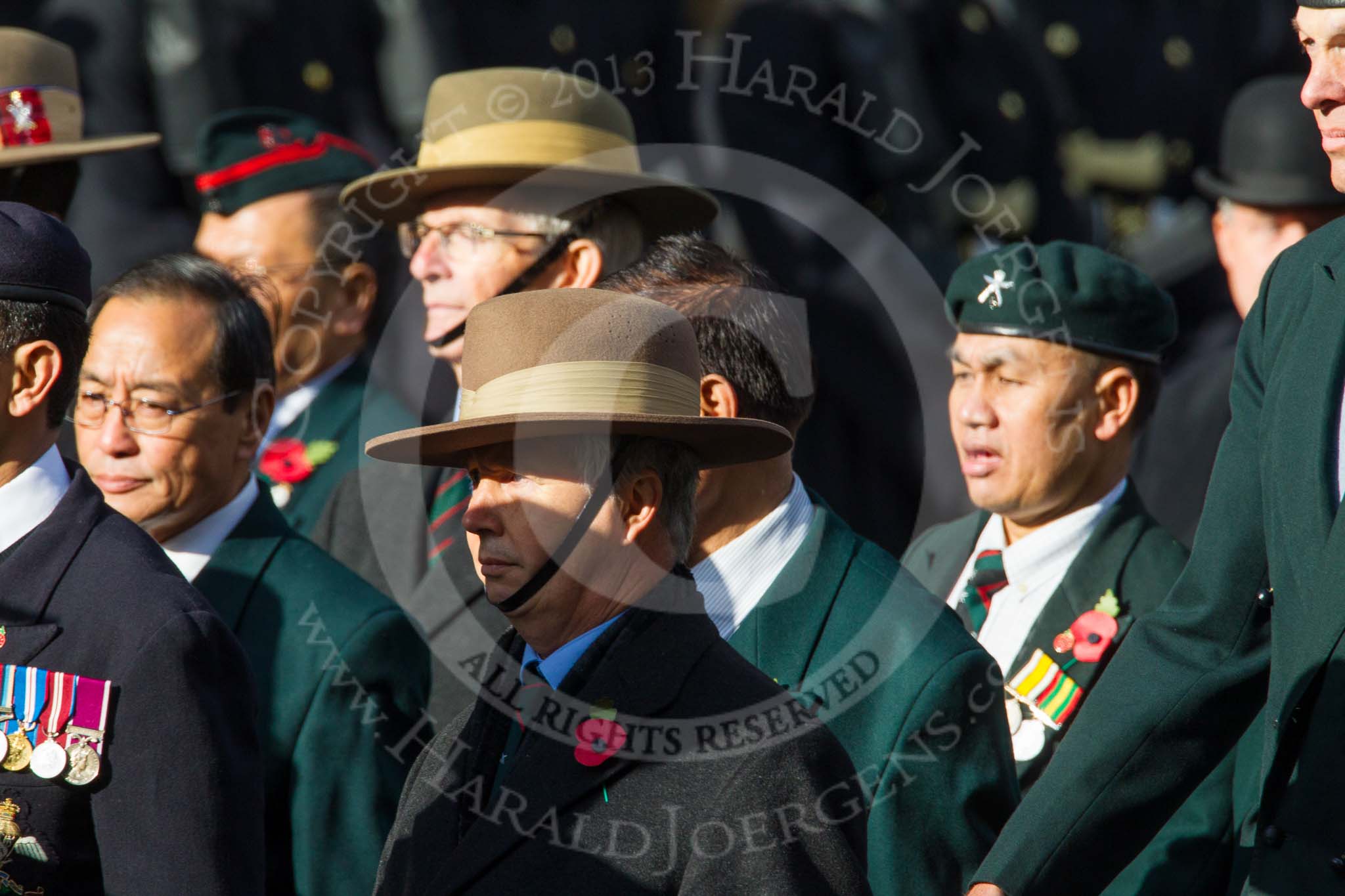 Remembrance Sunday at the Cenotaph in London 2014: Group D25 - Gurkha Brigade Association.
Press stand opposite the Foreign Office building, Whitehall, London SW1,
London,
Greater London,
United Kingdom,
on 09 November 2014 at 11:47, image #472