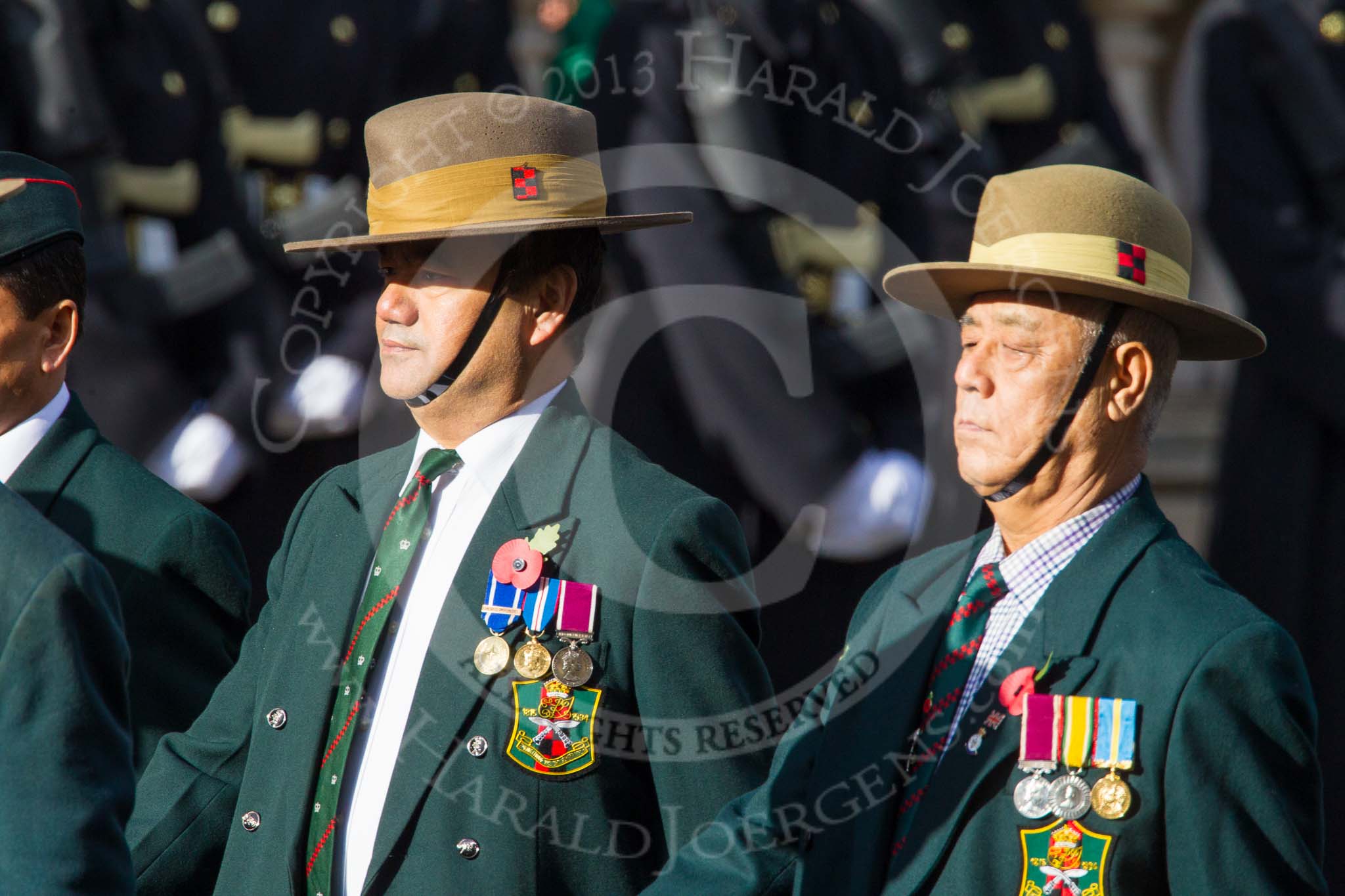 Remembrance Sunday at the Cenotaph in London 2014: Group D26 - British Gurkha Welfare Society.
Press stand opposite the Foreign Office building, Whitehall, London SW1,
London,
Greater London,
United Kingdom,
on 09 November 2014 at 11:47, image #476