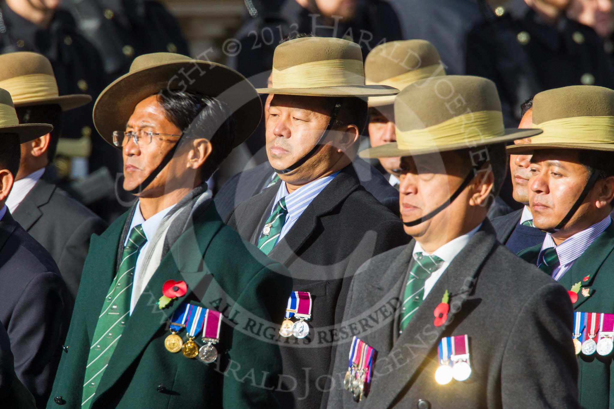 Remembrance Sunday at the Cenotaph in London 2014: Group D26 - British Gurkha Welfare Society.
Press stand opposite the Foreign Office building, Whitehall, London SW1,
London,
Greater London,
United Kingdom,
on 09 November 2014 at 11:47, image #480