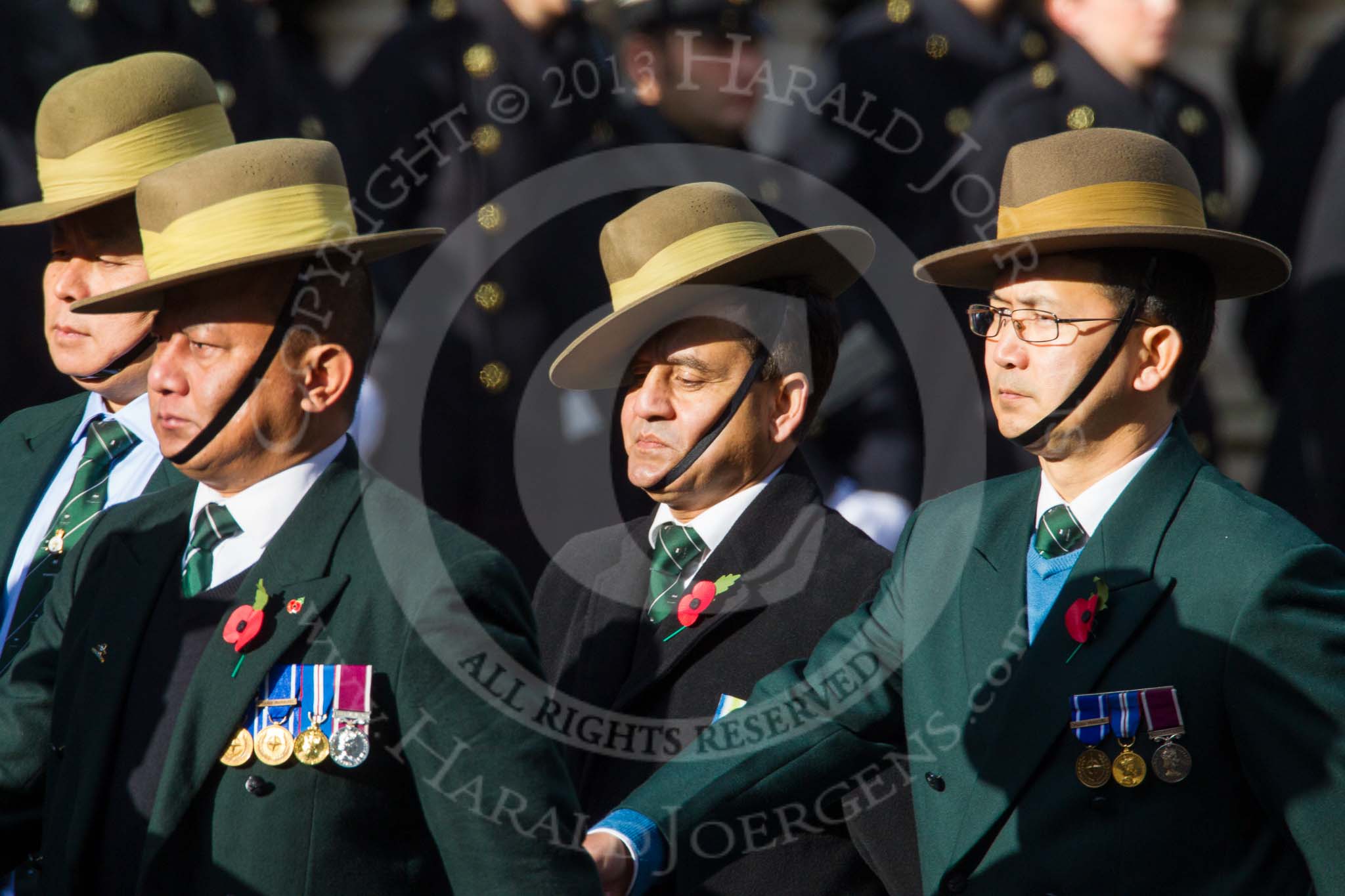 Remembrance Sunday at the Cenotaph in London 2014: Group D26 - British Gurkha Welfare Society.
Press stand opposite the Foreign Office building, Whitehall, London SW1,
London,
Greater London,
United Kingdom,
on 09 November 2014 at 11:47, image #488