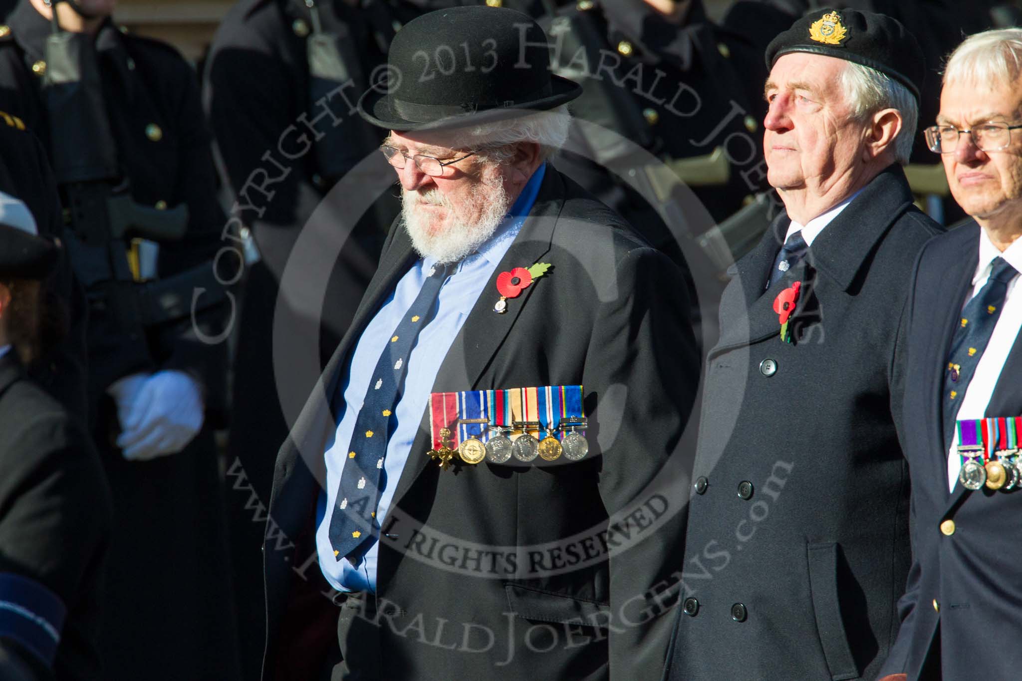 Remembrance Sunday at the Cenotaph in London 2014: Group E26 - Royal Fleet Auxiliary Association.
Press stand opposite the Foreign Office building, Whitehall, London SW1,
London,
Greater London,
United Kingdom,
on 09 November 2014 at 11:53, image #783