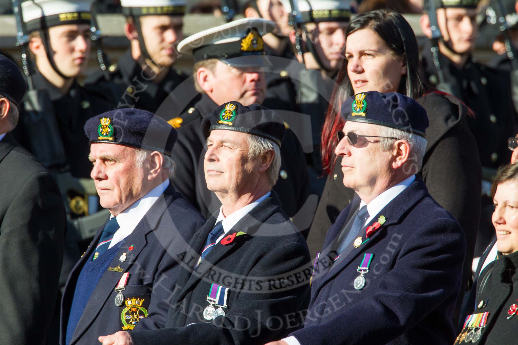 Remembrance Sunday at the Cenotaph in London 2014: Group E26 - Royal Fleet Auxiliary Association.
Press stand opposite the Foreign Office building, Whitehall, London SW1,
London,
Greater London,
United Kingdom,
on 09 November 2014 at 11:53, image #787